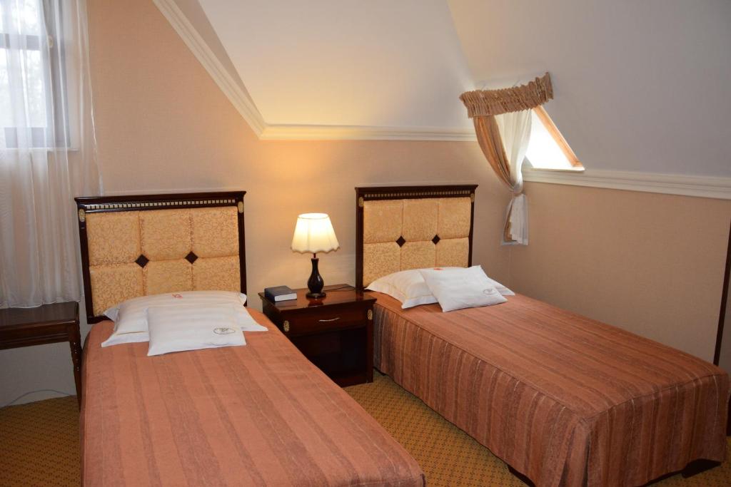 Двухместный (Улучшенный двухместный номер с 1 кроватью или 2 отдельными кроватями) отеля Villa Hotel, Дебрецен