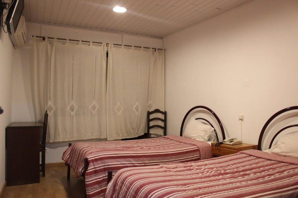 Двухместный (Двухместный номер с 2 отдельными кроватями) гостевого дома Pensão Aliança, Гуарда