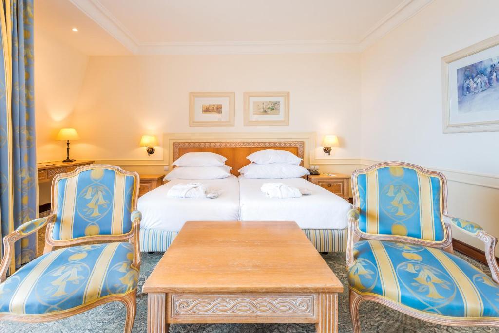Двухместный (Улучшенный двухместный номер Делюкс с 2 отдельными кроватями) отеля Pestana Royal Premium All Inclusive Ocean & Spa Resort, Фуншал