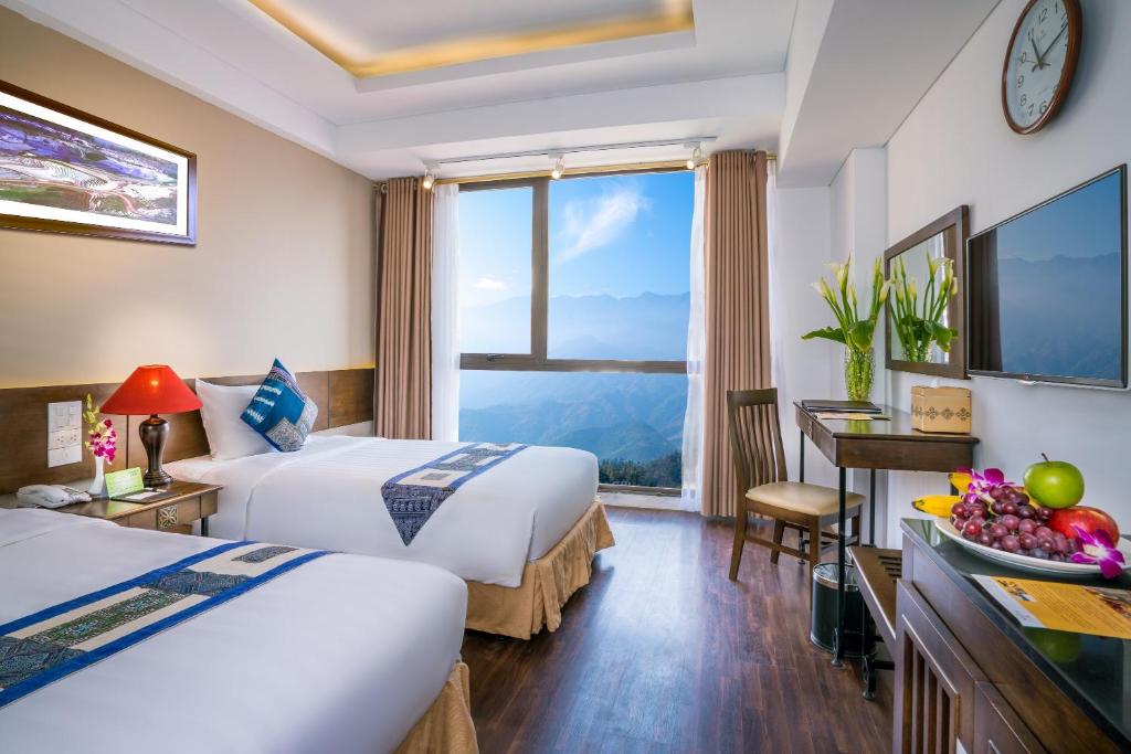 Двухместный (Двухместный номер Делюкс с 1 кроватью или 2 отдельными кроватями, вид на горы) отеля Amazing Hotel Sapa, Сапа