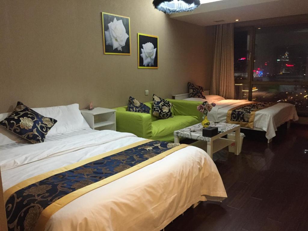 Двухместный (Двухместный номер Делюкс с 2 отдельными кроватями) апарт-отеля Beijing Huihui Home ApartHotel Chang'an Inn Branch, Пекин