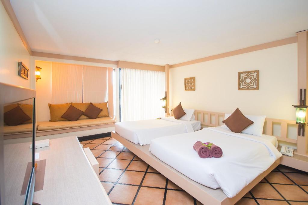 Двухместный (Улучшенный двухместный номер с 1 кроватью или 2 отдельными кроватями и видом на сад) курортного отеля Phuket Island View, Пхукет