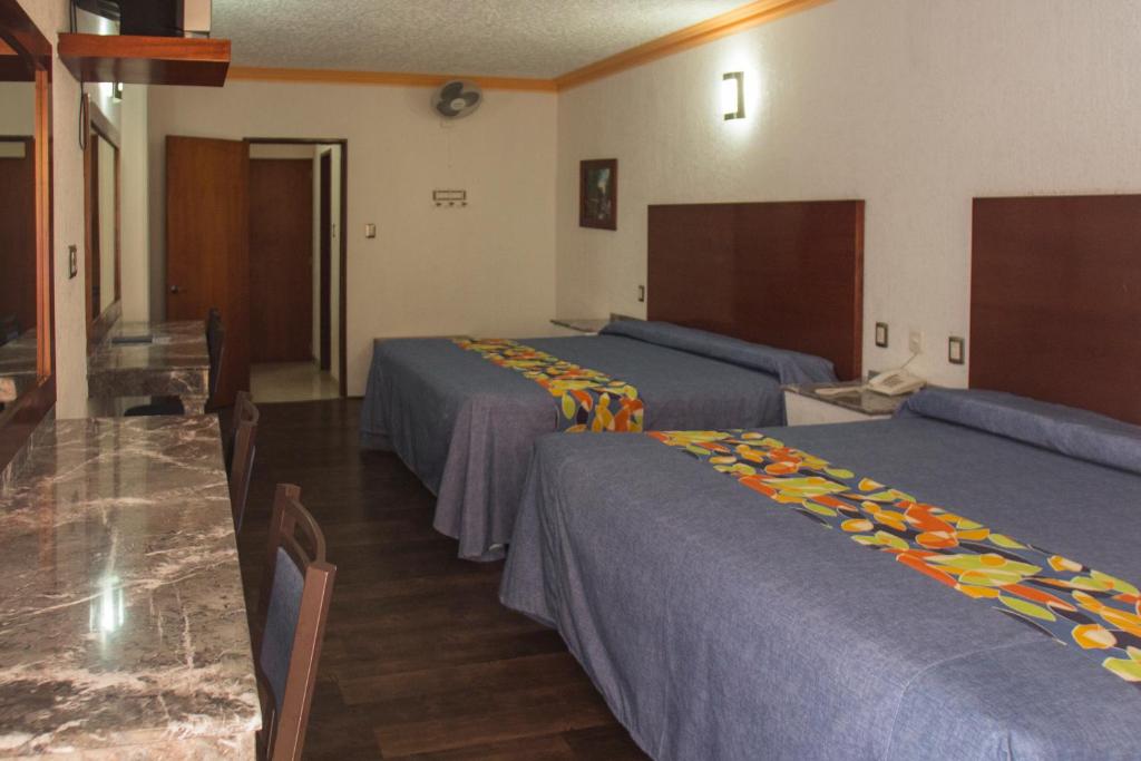Двухместный (Двухместный номер с 2 отдельными кроватями и террасой) отеля Las Avenidas, Пачука-де-Сото