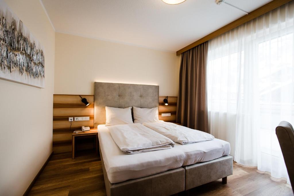 Двухместный (Двухместный номер с основными удобствами и 1 кроватью) апарт-отеля Aparthotel Dorfplatzl Garni, Тукс