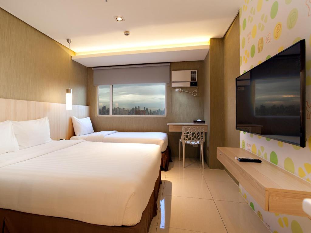 Трехместный (Стандартный трехместный номер) отеля Hotel 101 Manila, Манила