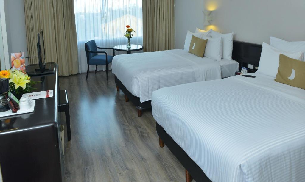 Четырехместный (Двухместный номер с 2 двуспальными кроватями - Доступ для гостей с ограниченными физическими возможностями) отеля Best Western PLUS Gran Hotel Morelia, Морелия