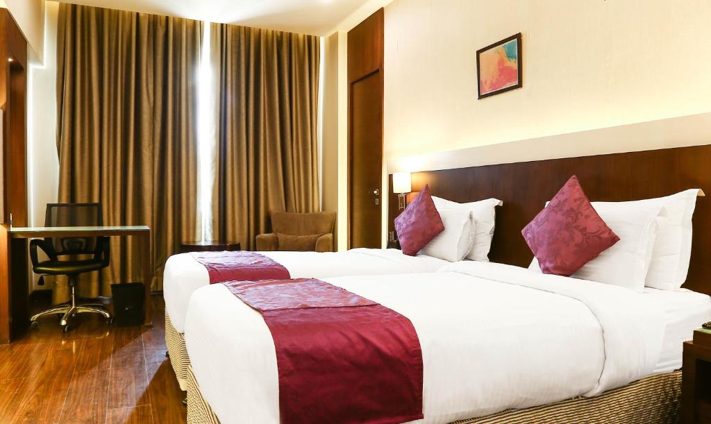 Двухместный (Двухместный номер Делюкс с 1 кроватью) отеля Treebo Select Eden Residency, Гургаон
