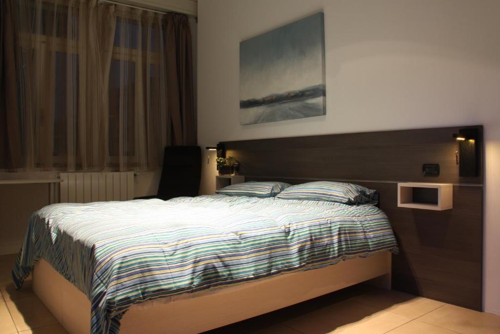 Двухместный (Двухместный номер с 1 кроватью или 2 отдельными кроватями) отеля Prenditempo, Бергамо