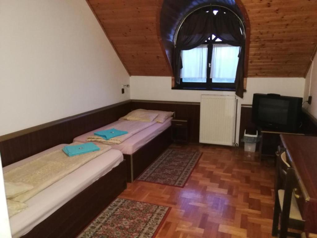Двухместный (Двухместный номер с 2 отдельными кроватями) отеля Peregrino Panzió, Будаорш