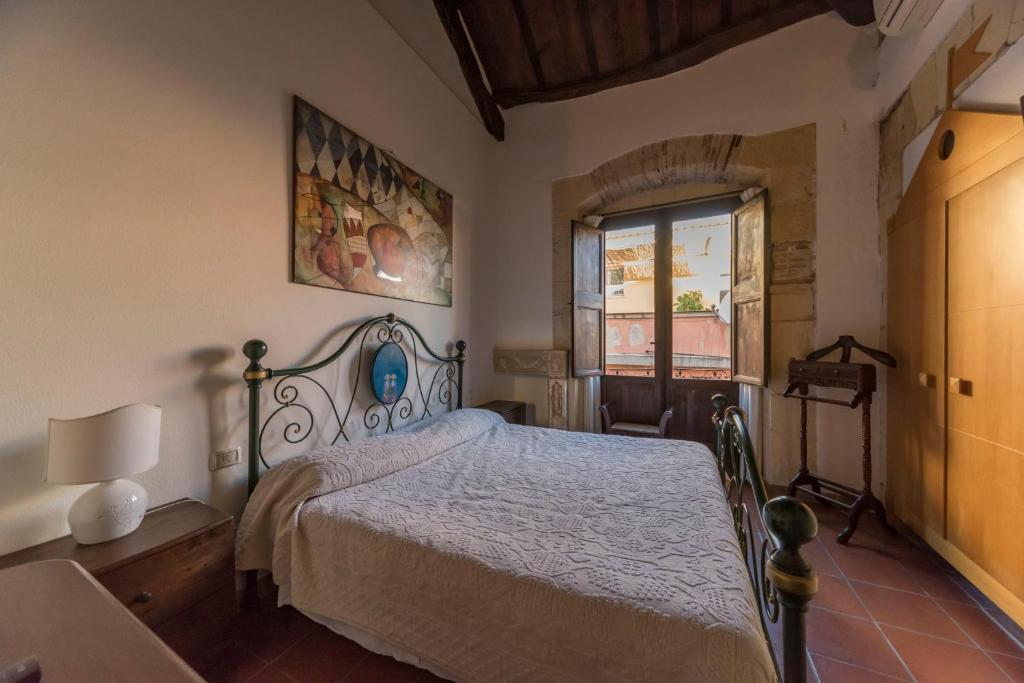 Двухместный (Улучшенный двухместный номер с 1 кроватью или 2 отдельными кроватями) гостевого дома Relais del Porto - B&B, Кальяри
