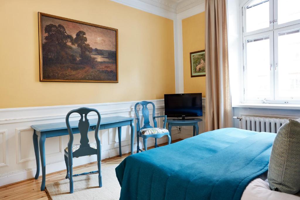Двухместный (Двухместный номер с 2 отдельными кроватями и общей ванной комнатой в коридоре) отеля Hotel Hornsgatan, Стокгольм