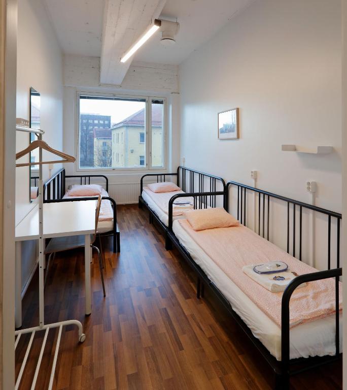 Трехместный (Трехместный номер с общей ванной комнатой) хостела CheapSleep Hostel Helsinki, Хельсинки