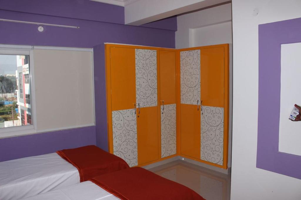 Трехместный (Роскошный трехместный номер) хостела Mahas Inn, Хайдарабад