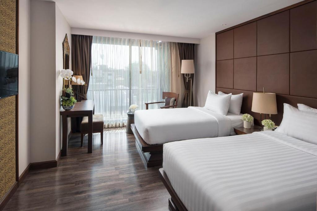 Двухместный (Улучшенный двухместный номер с 2 отдельными кроватями) отеля Casa Nithra, Бангкок