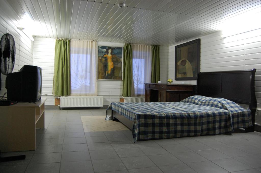 Двухместный (Двухместный номер эконом-класса с 1 кроватью и общей ванной комнатой) отеля Hotel Luiize, Екабпилс