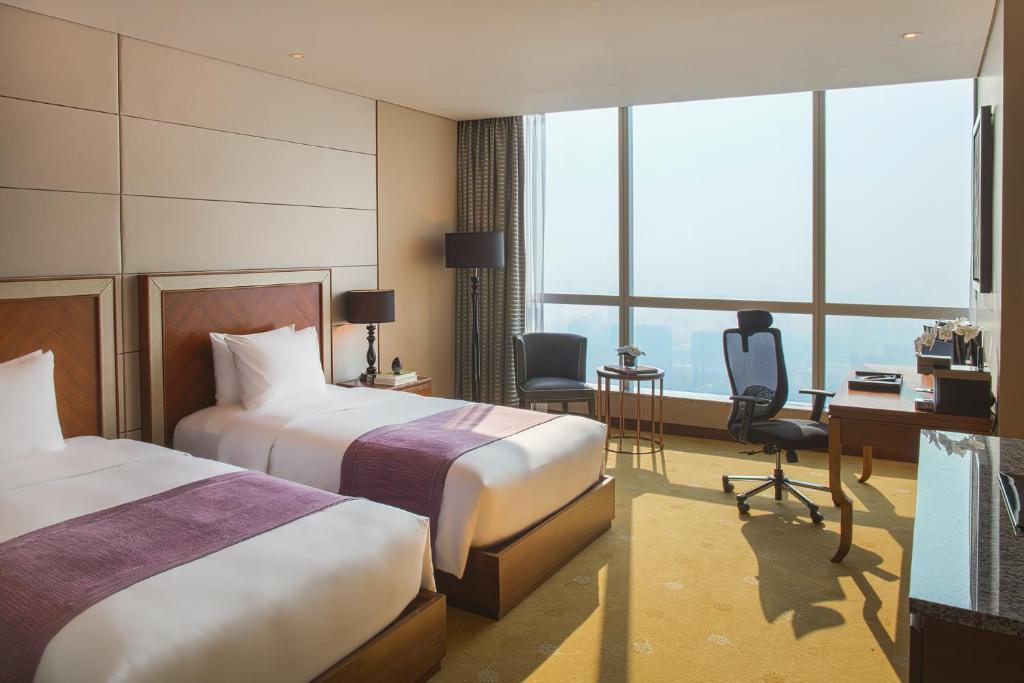 Двухместный (Двухместный номер с 2 отдельными кроватями - Интернациональный клуб) отеля InterContinental Hanoi Landmark72, Ханой