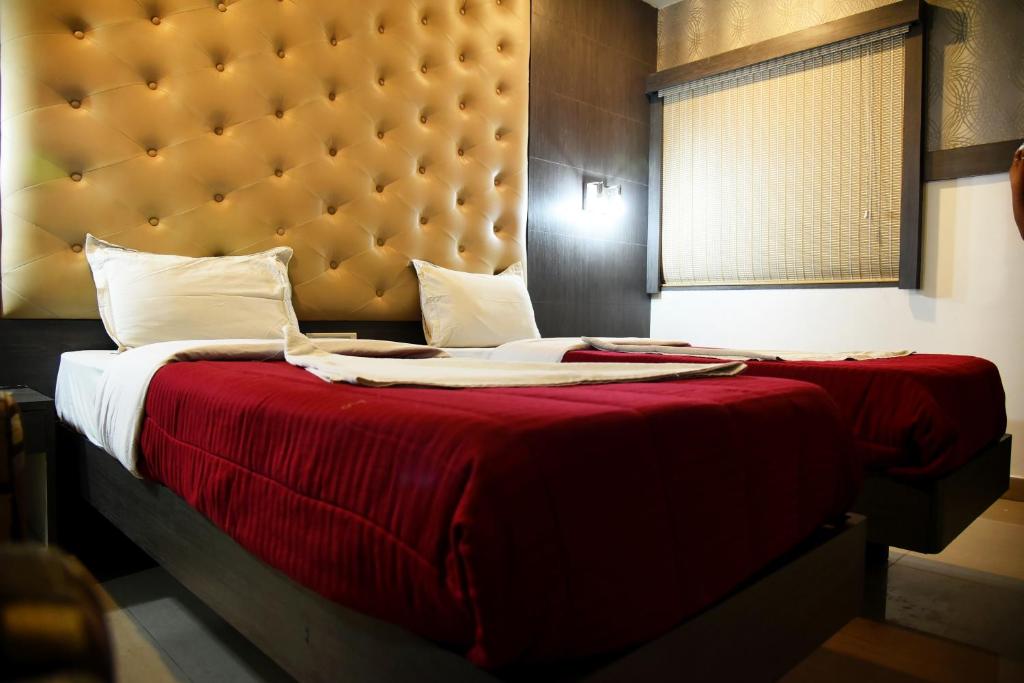 Двухместный (Улучшенный двухместный номер с 1 кроватью или 2 отдельными кроватями) отеля Grand Choice, Бангалор