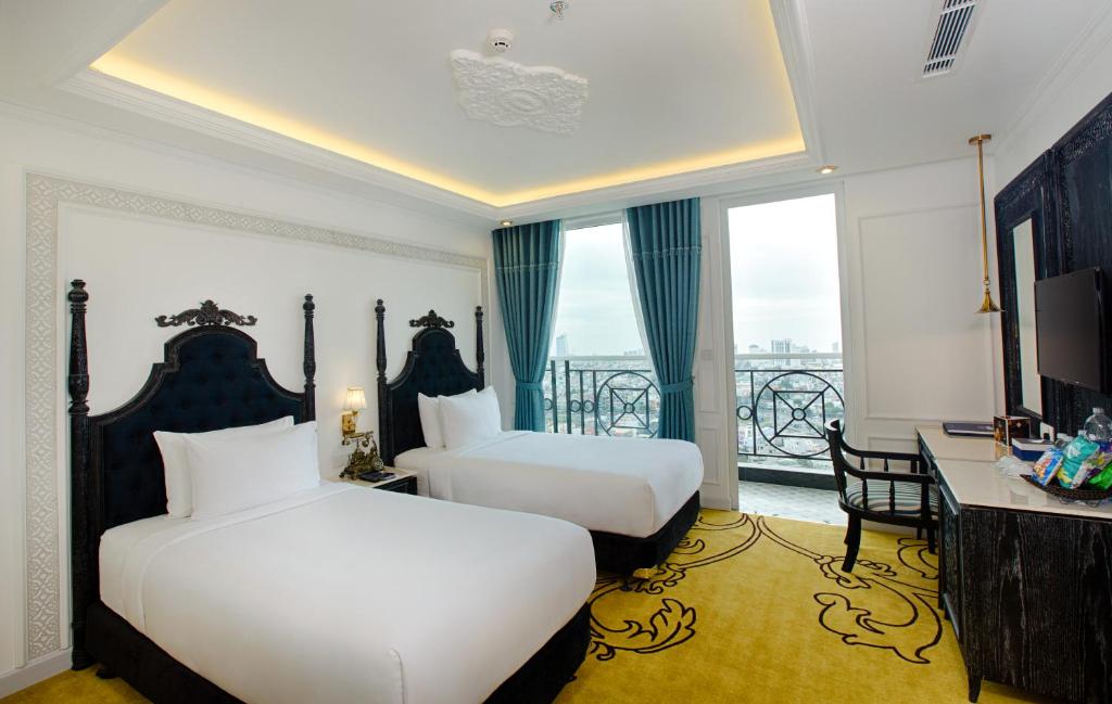 Апартаменты (Апартаменты с 2 спальнями и видом на море) отеля Fivitel Da Nang, Дананг