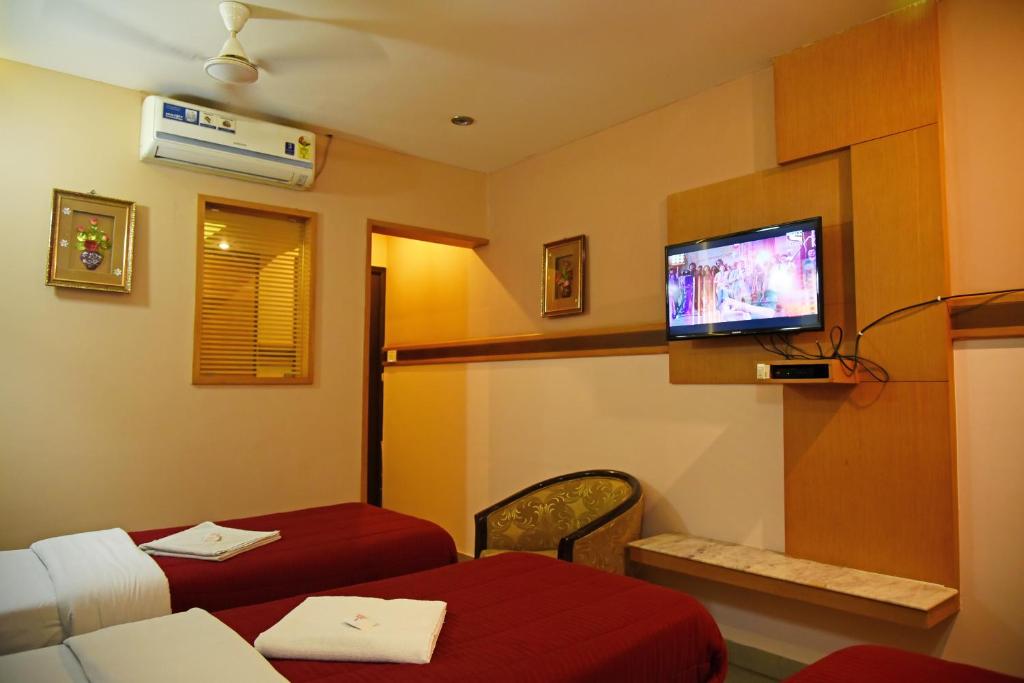 Трехместный (Бюджетный трехместный номер) отеля Grand Choice, Бангалор
