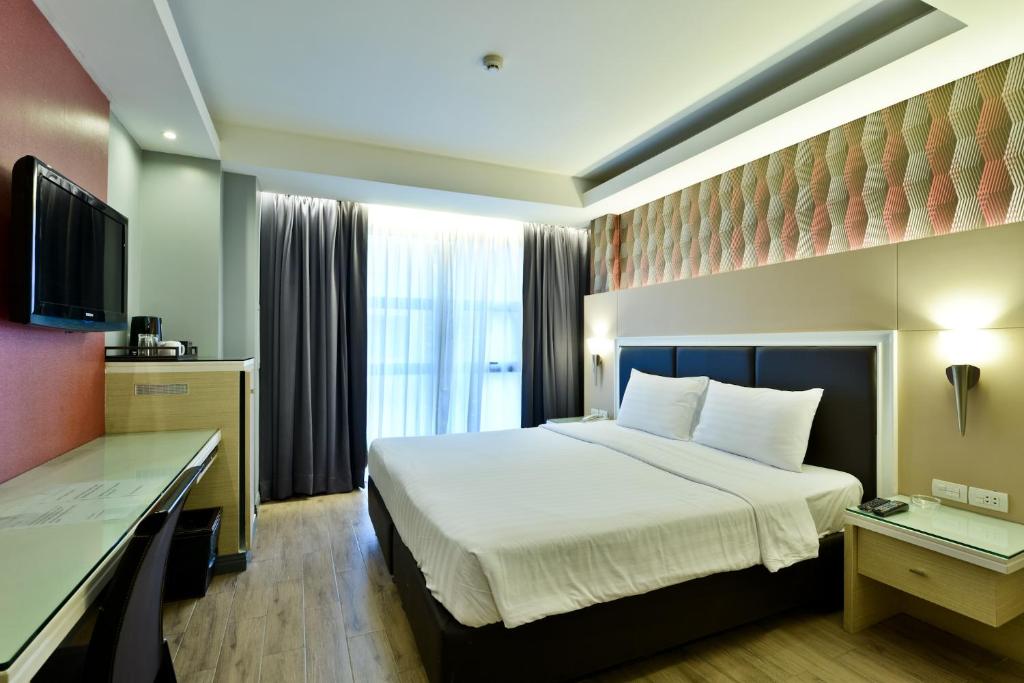 Двухместный (Двухместный номер Делюкс с 1 кроватью) отеля Prestige Suites, Бангкок