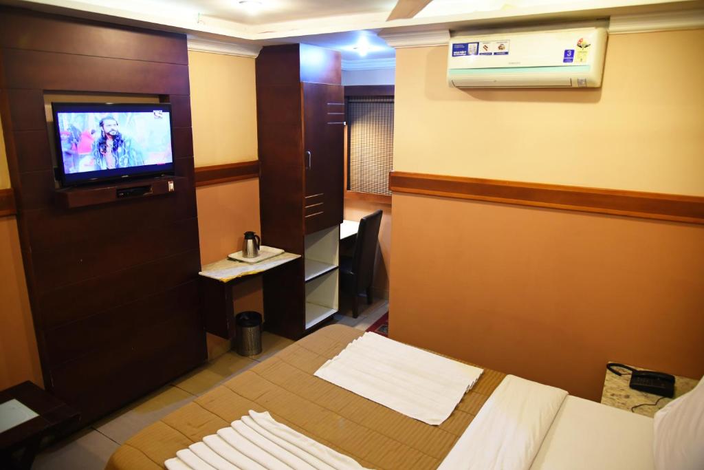 Двухместный (Двухместный номер Делюкс с 1 кроватью) отеля Grand Choice, Бангалор