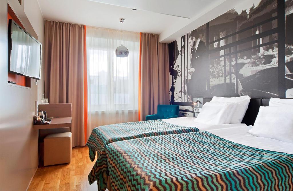 Двухместный (Стандартный двухместный номер с 1 кроватью или 2 отдельными кроватями) отеля Solo Sokos Hotel Lahden Seurahuone, Лахти