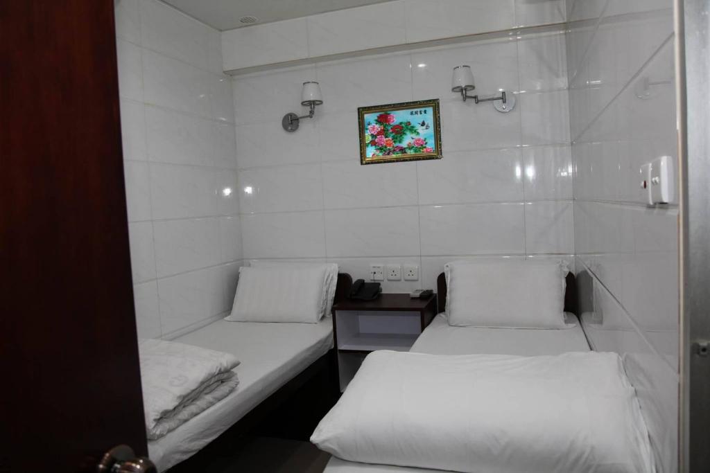 Двухместный (Бюджетный двухместный номер с 2 отдельными кроватями) гостевого дома Kingdom Guest House, Гонконг (город)