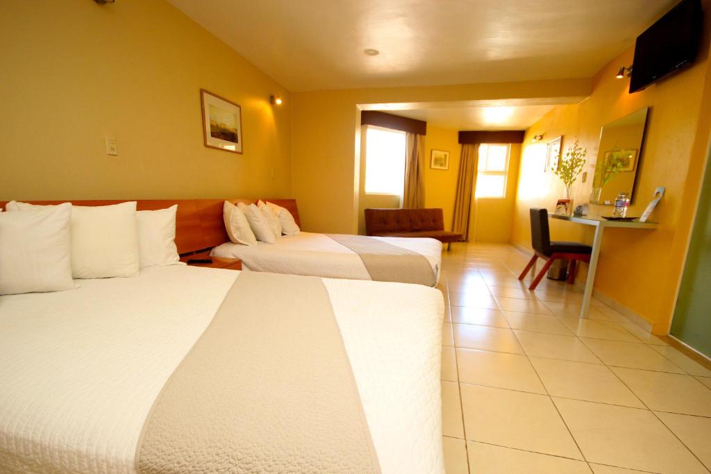 Двухместный (Двухместный номер с 2 двуспальными кроватями) отеля Balcon Del Cielo, Гуанахуато