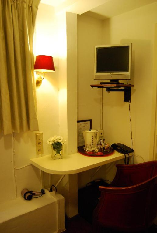 Двухместный (Бюджетный двухместный номер с 2 отдельными кроватями) отеля Amsterdam House Hotel Eureka, Амстердам