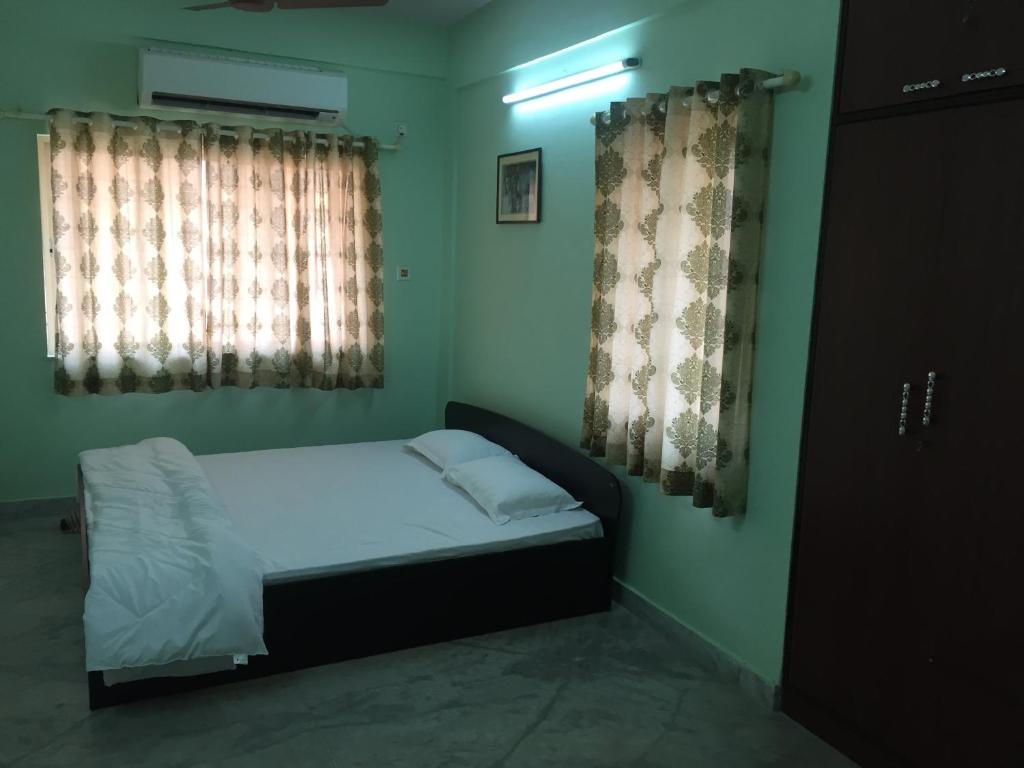 Двухместный (Двухместный номер Делюкс с 1 кроватью) семейного отеля Nalanda Tulip, Калькутта