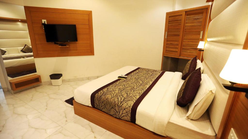 Двухместный (Двухместный номер Делюкс с 1 кроватью или 2 отдельными кроватями) отеля Airport Hotel Aero-Star, Нью-Дели