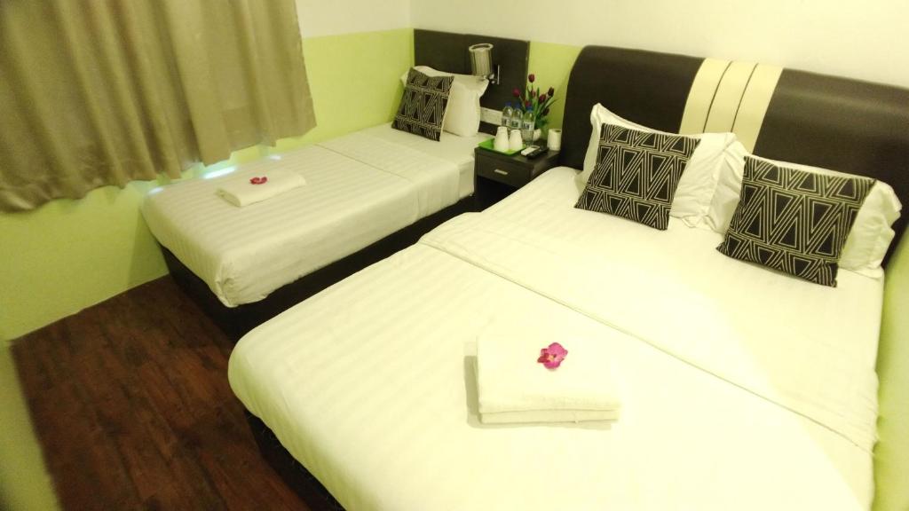 Семейный (Семейный номер) отеля Apple 1 Hotel Queensbay, Пенанг