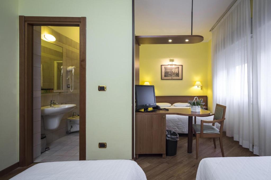 Четырехместный (Четырехместный номер) отеля Nuovo Hotel Del Porto, Болонья