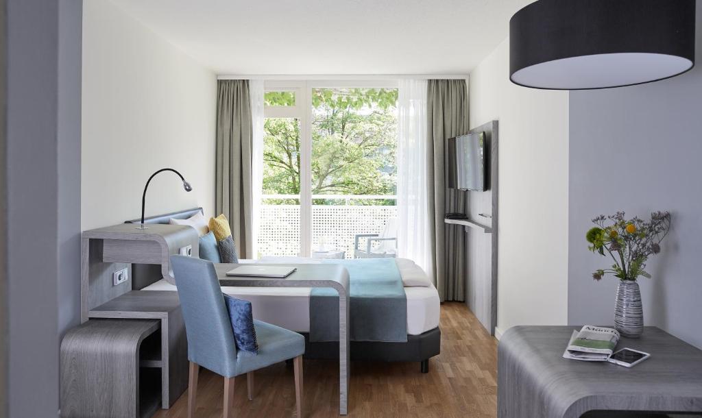 Апартаменты (Одноместные апартаменты бизнес-класса) апарт-отеля Derag Livinghotel am Olympiapark, Мюнхен