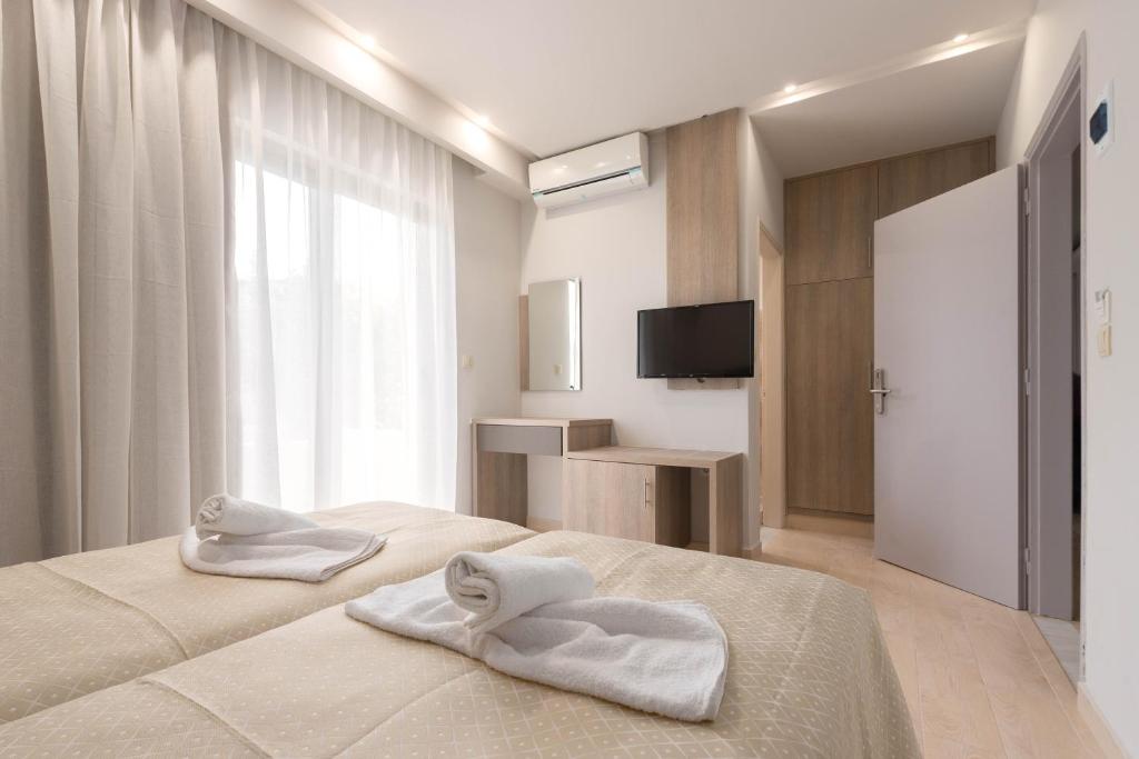 Двухместный (Двухместный номер Делюкс с 1 кроватью) отеля Saint George Resort, Архангелос (Эгейские острова)