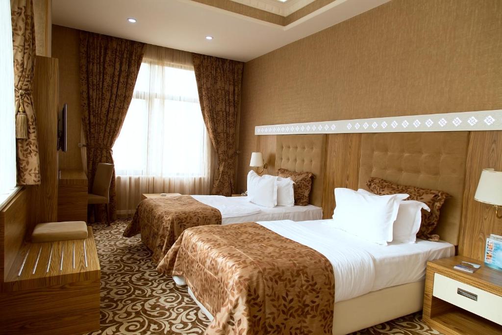 Двухместный (Стандартный двухместный номер с 2 отдельными кроватями) отеля Divan Express Baku, Баку