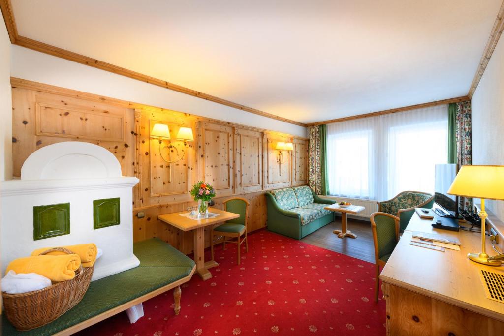 Двухместный (Улучшенный двухместный номер с 1 кроватью) отеля Wellnesshotel Schönruh - Только для взрослых, Зефельд-ин-Тироль