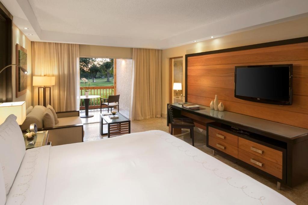 Двухместный (Номер «Элитный» с патио (для 2 взрослых и 1 ребенка) - Предоставляется гольф-карт) курортного отеля Casa de Campo Resort & Villas, Ла-Романа