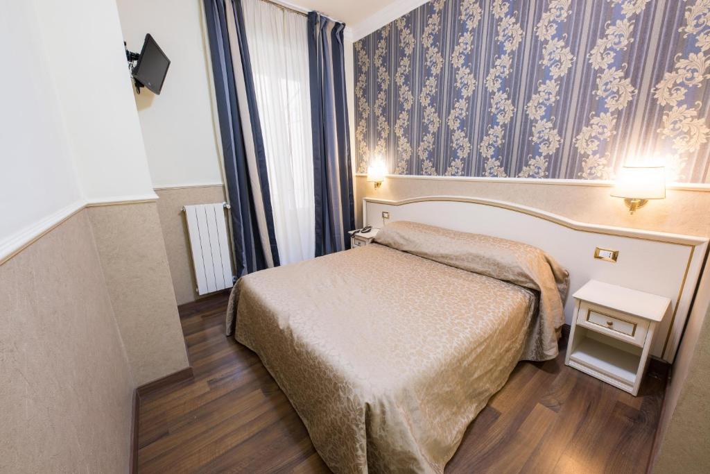 Двухместный (Двухместный номер с 1 кроватью или 2 отдельными кроватями) отеля Hotel Anfiteatro Flavio, Рим
