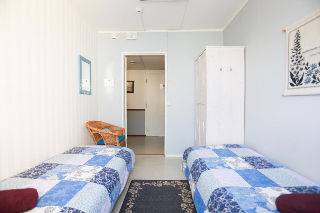 Двухместный (Двухместный номер с 2 отдельными кроватями и общей ванной комнатой) отеля Bed&Breakfast Tuure, Турку