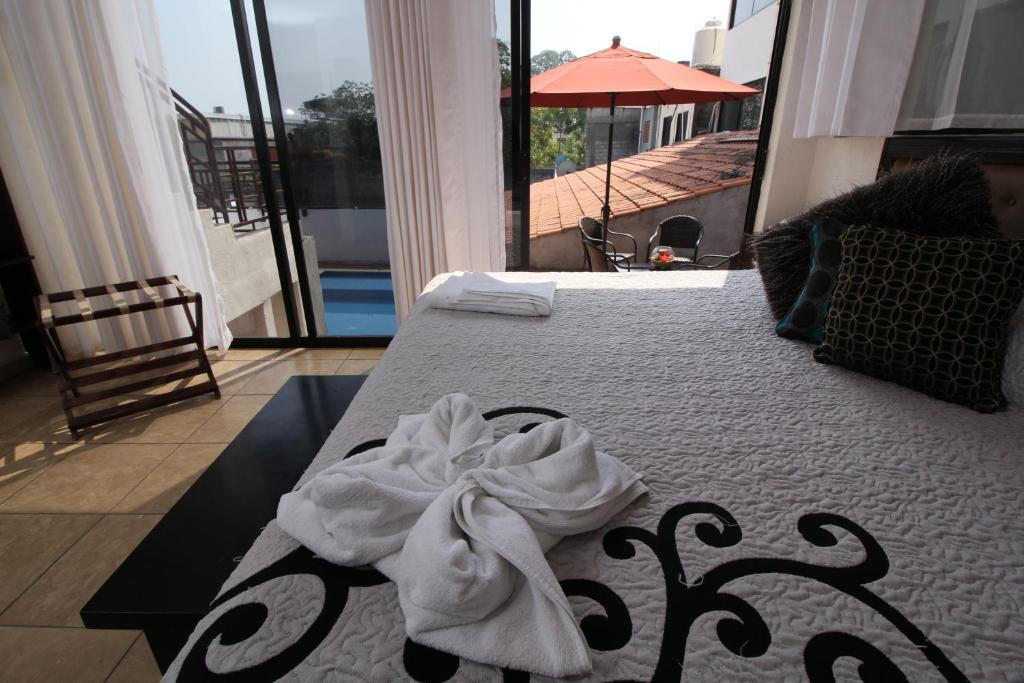 Двухместный (Улучшенный двухместный номер с 1 кроватью или 2 отдельными кроватями) отеля Hotel Sacre, Сан-Хуан Баутиста Тукстепек