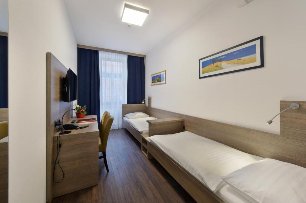 Двухместный (Двухместный номер с 2 отдельными кроватями) отеля Hotel Lucia, Вена