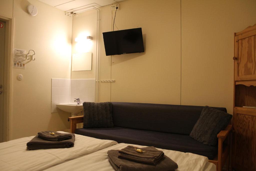 Двухместный (Двухместный номер с 1 кроватью и общей ванной комнатой) хостела Motelli RukaTupa, Рука