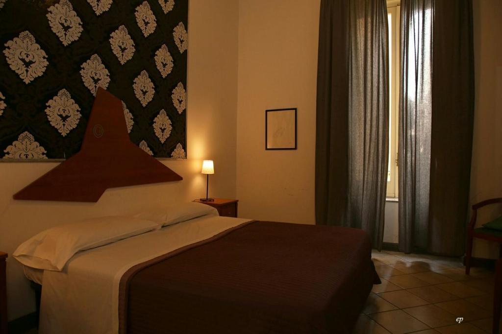 Одноместный (Двухместный номер с 1 кроватью (для 1 взрослого)) отеля Caravaggio Hotel, Неаполь