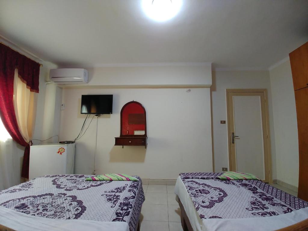 Двухместный (Двухместный номер с 1 кроватью и собственной ванной комнатой) хостела Sun Hostel Cairo, Каир