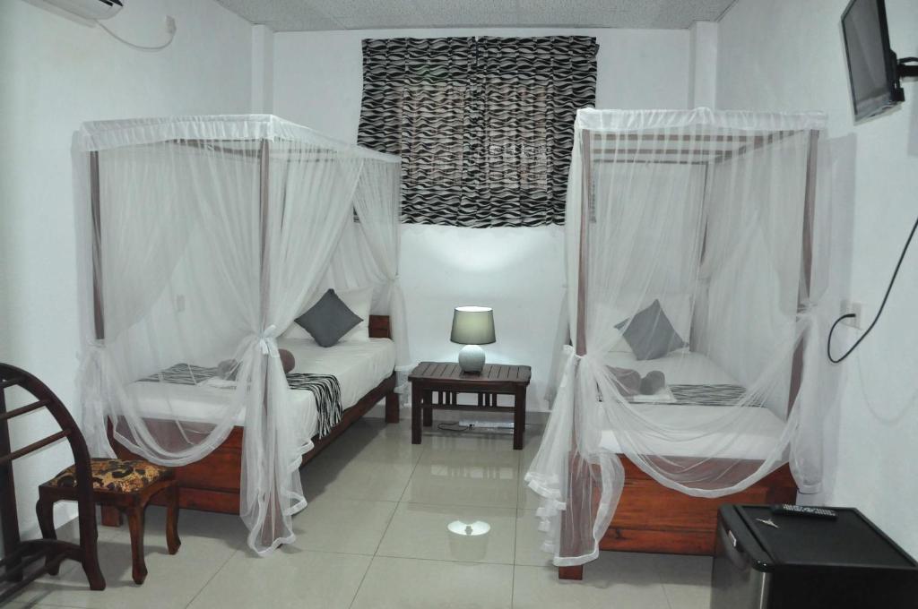 Двухместный (Стандартный двухместный номер с 2 отдельными кроватями) отеля El Corazon De Hikkaduwa, Хиккадува