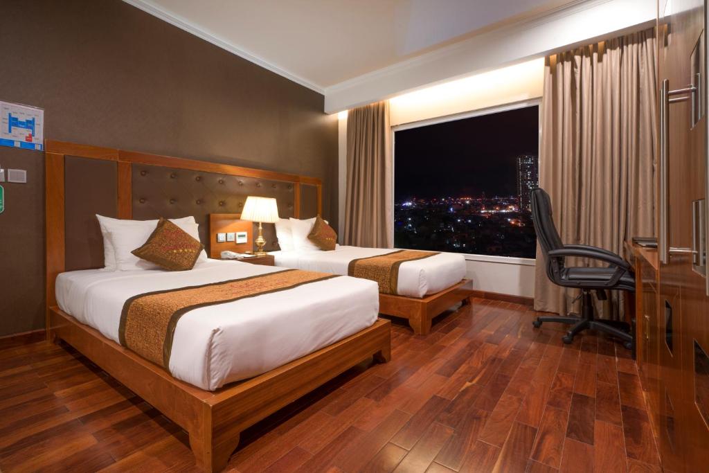 Двухместный (Двухместный номер Делюкс с 2 отдельными кроватями и видом на город) отеля Samdi Hotel, Дананг