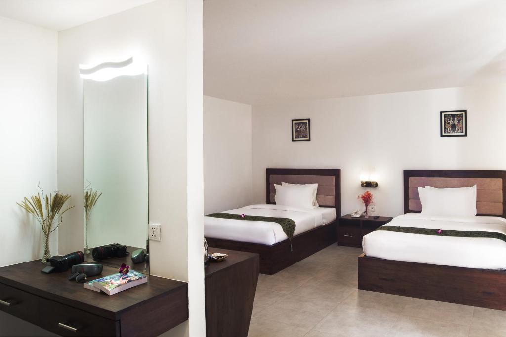 Двухместный (Двухместный номер Делюкс с 2 отдельными кроватями) отеля Kuch Oudom Hotel, Пномпень