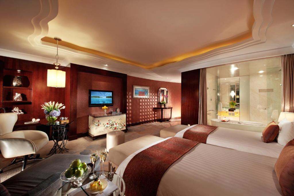 Двухместный (Улучшенный двухместный номер с 2 отдельными кроватями) отеля New Century Grand Hotel Ningbo, Нинбо