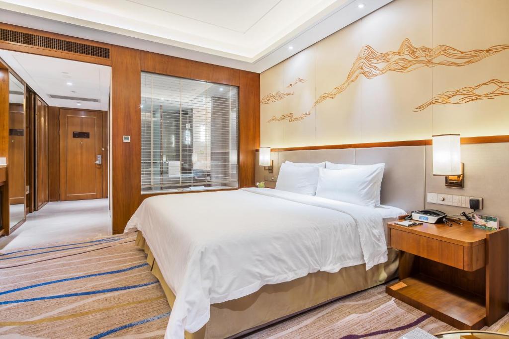 Двухместный (Двухместный номер Делюкс с 1 кроватью) отеля Jinling Shihu Garden Hotel, Сучжоу